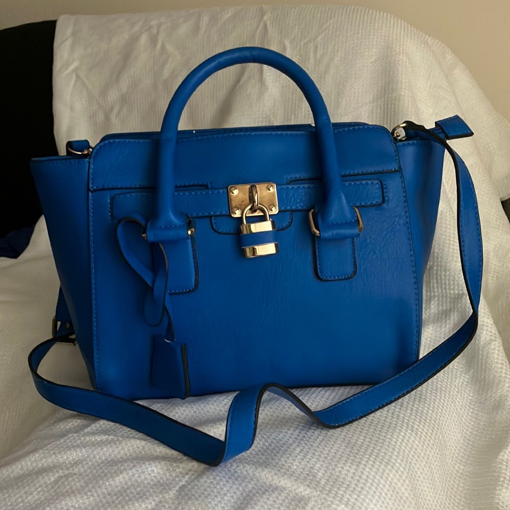 Blue satchel purse with detachable cross body strap
